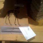 photo(2) "This is Not a Bomb" - left inside a Thomas Paul journal shelved under some shirts @ the women's clothing store Anthropologie in the Domain (11410 Century Oaks Terrace Austin, TX 78758)